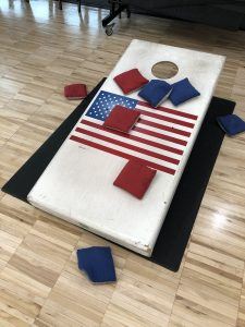 Cornhole Board with Bags on It